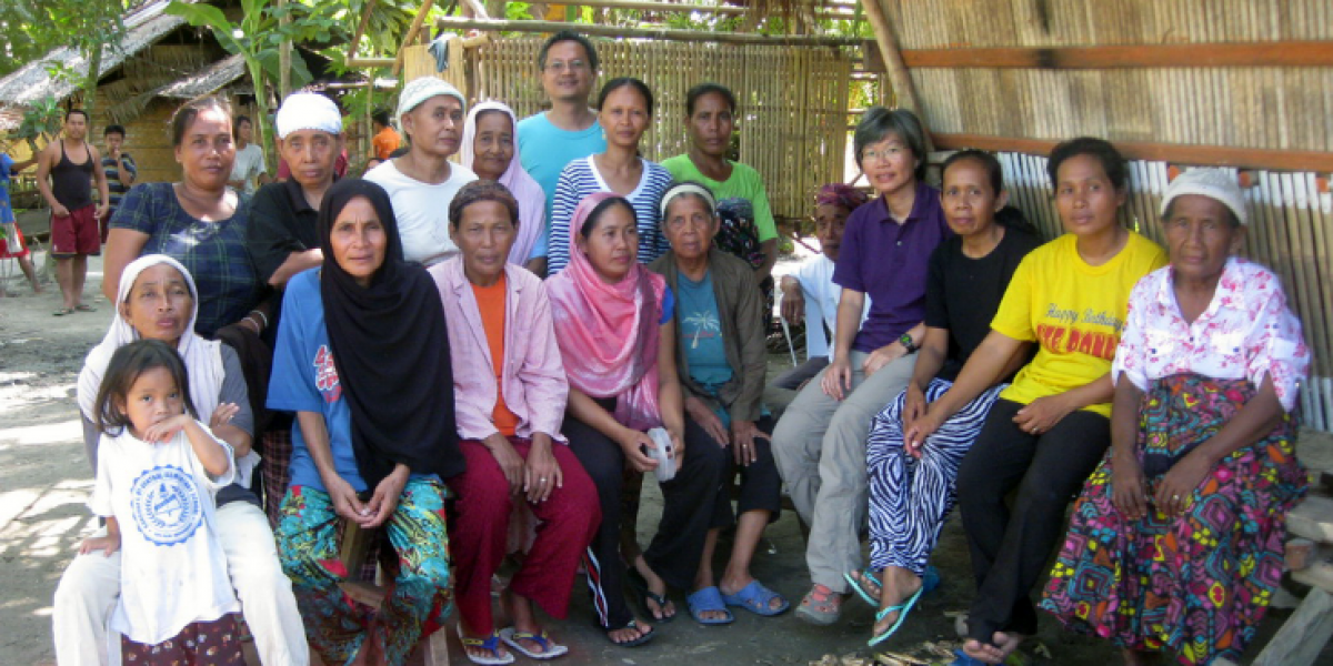 Des personnes déplacées participent à une réunion organisée par le personnel de JRS à Maguindanao, Philippines.